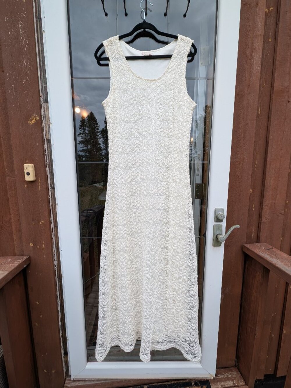 beautiful white dress with detailed overlay